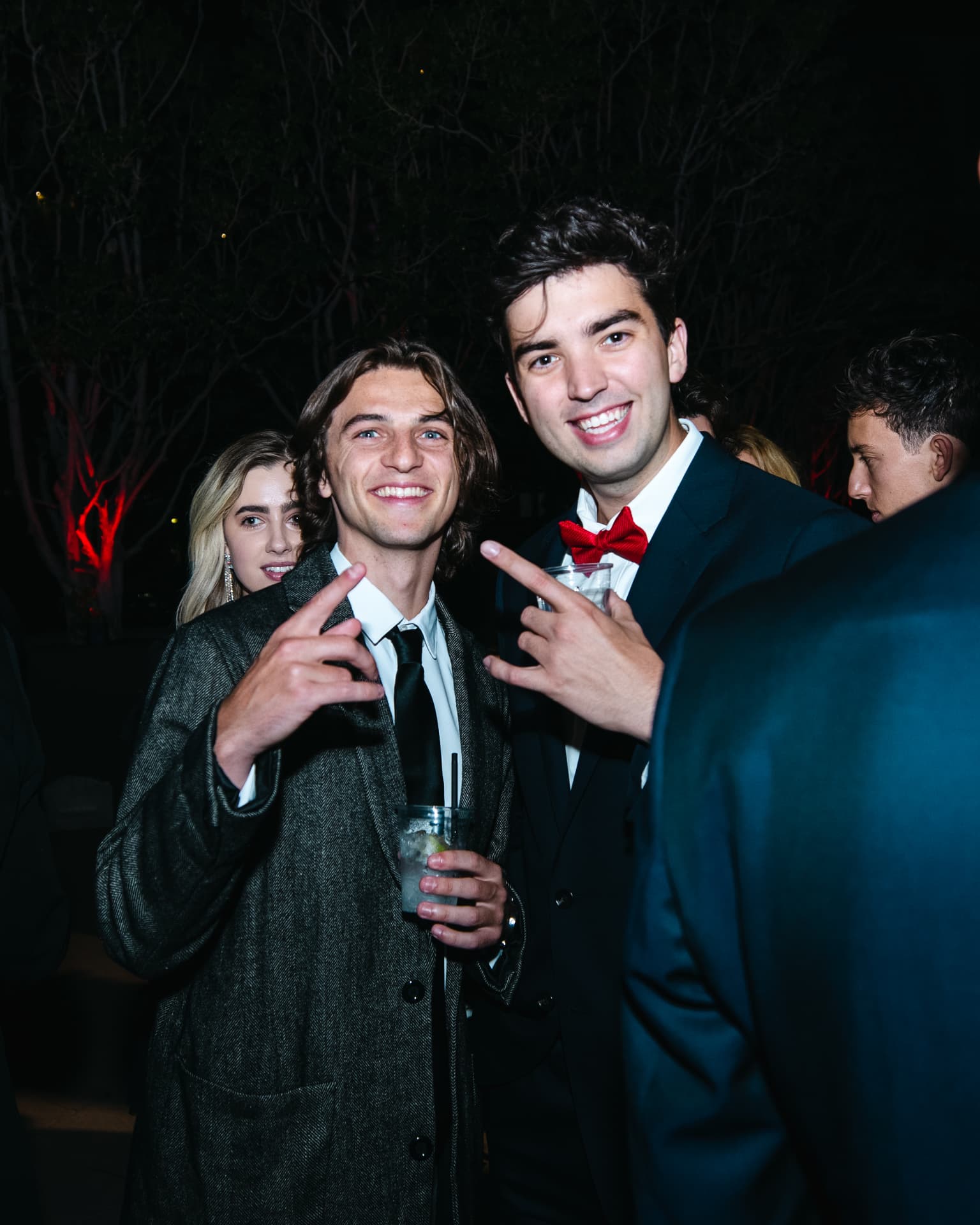 Guests celebrating at a black-tie premiere afterparty