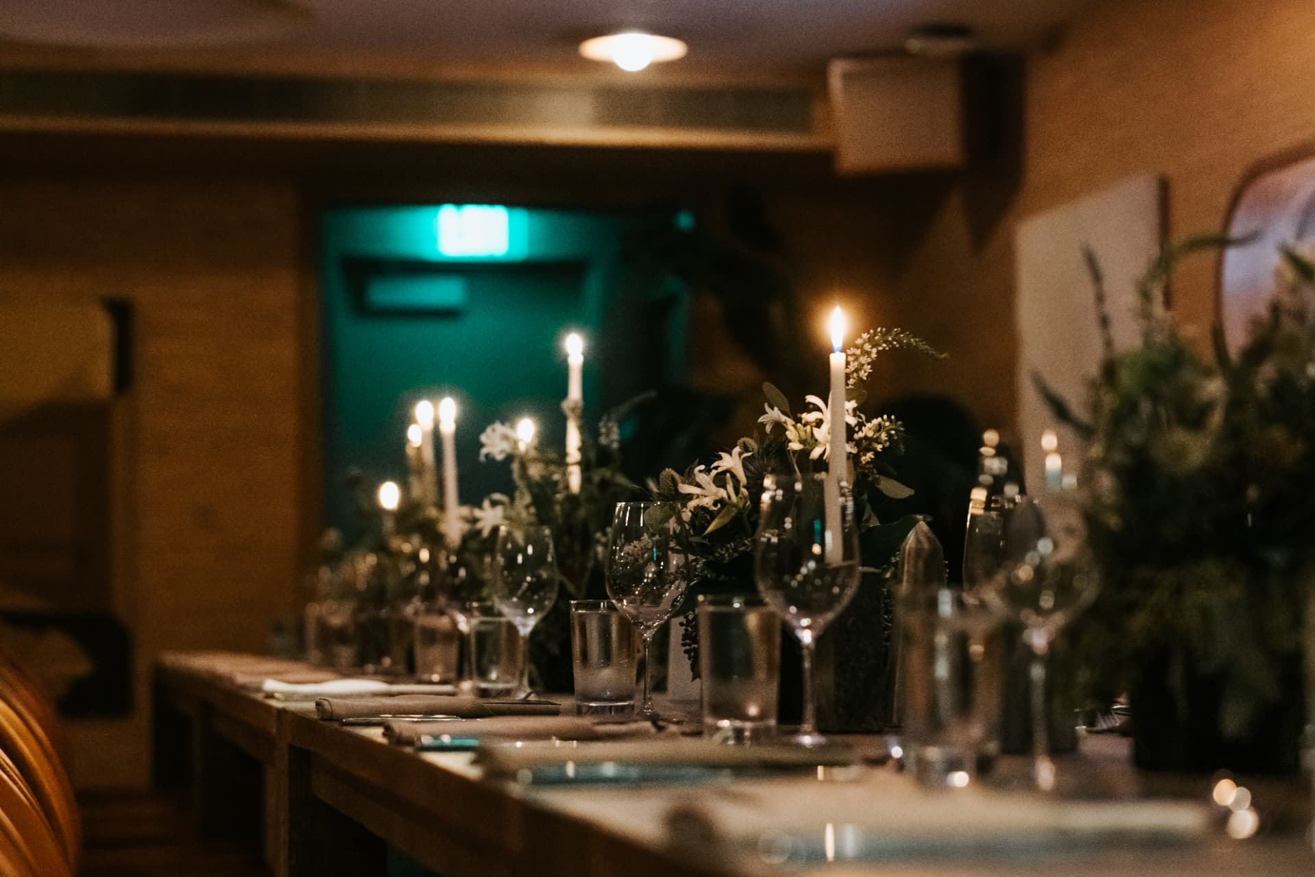 Candlelit private dinner table setting