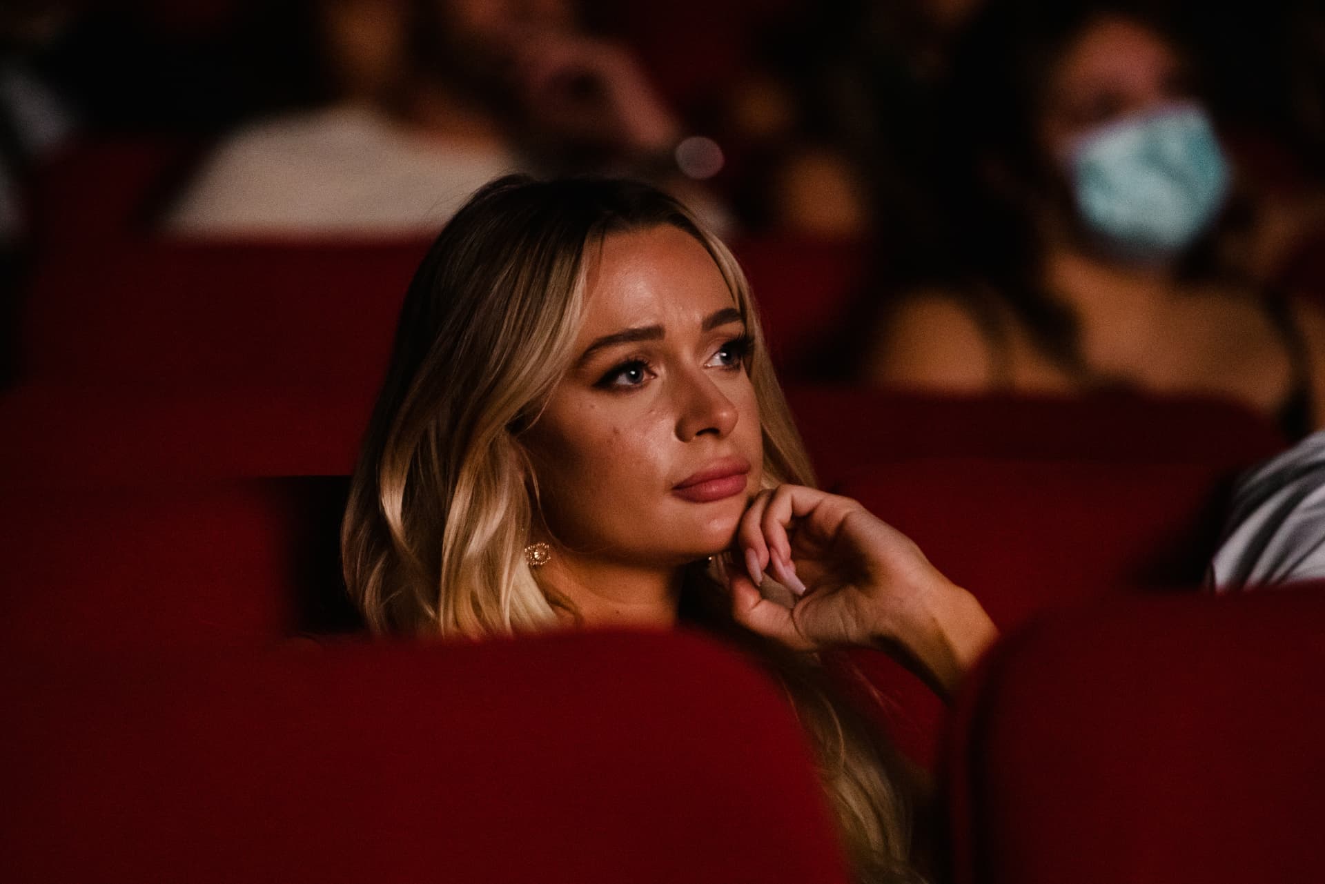 Audience member watching a film premiere