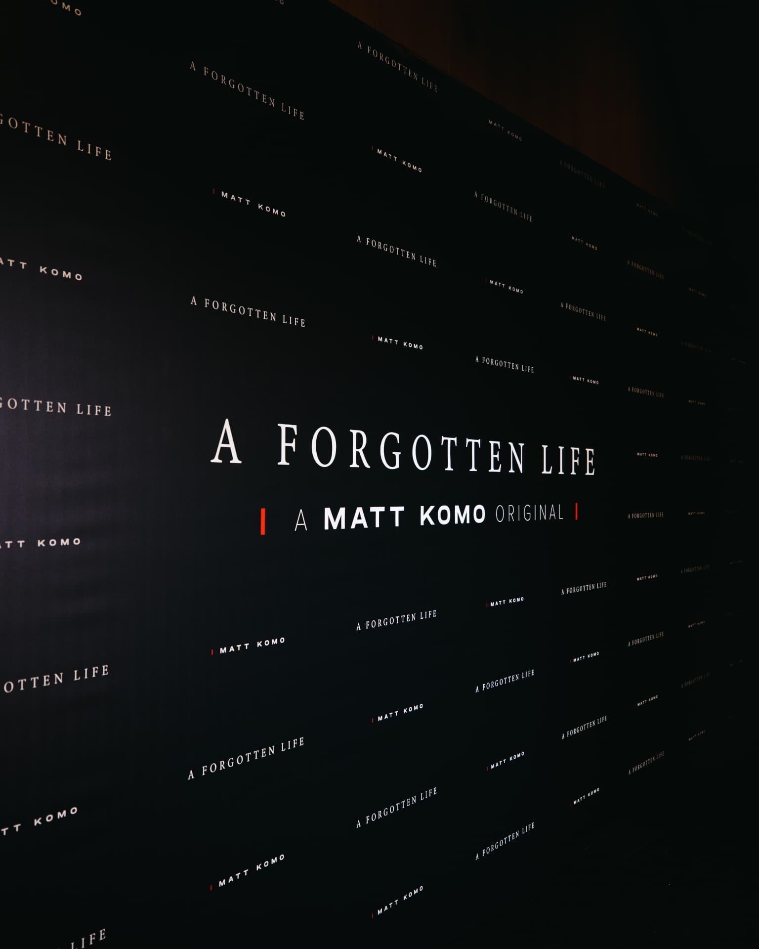 A Forgotten Life premiere step-and-repeat wall