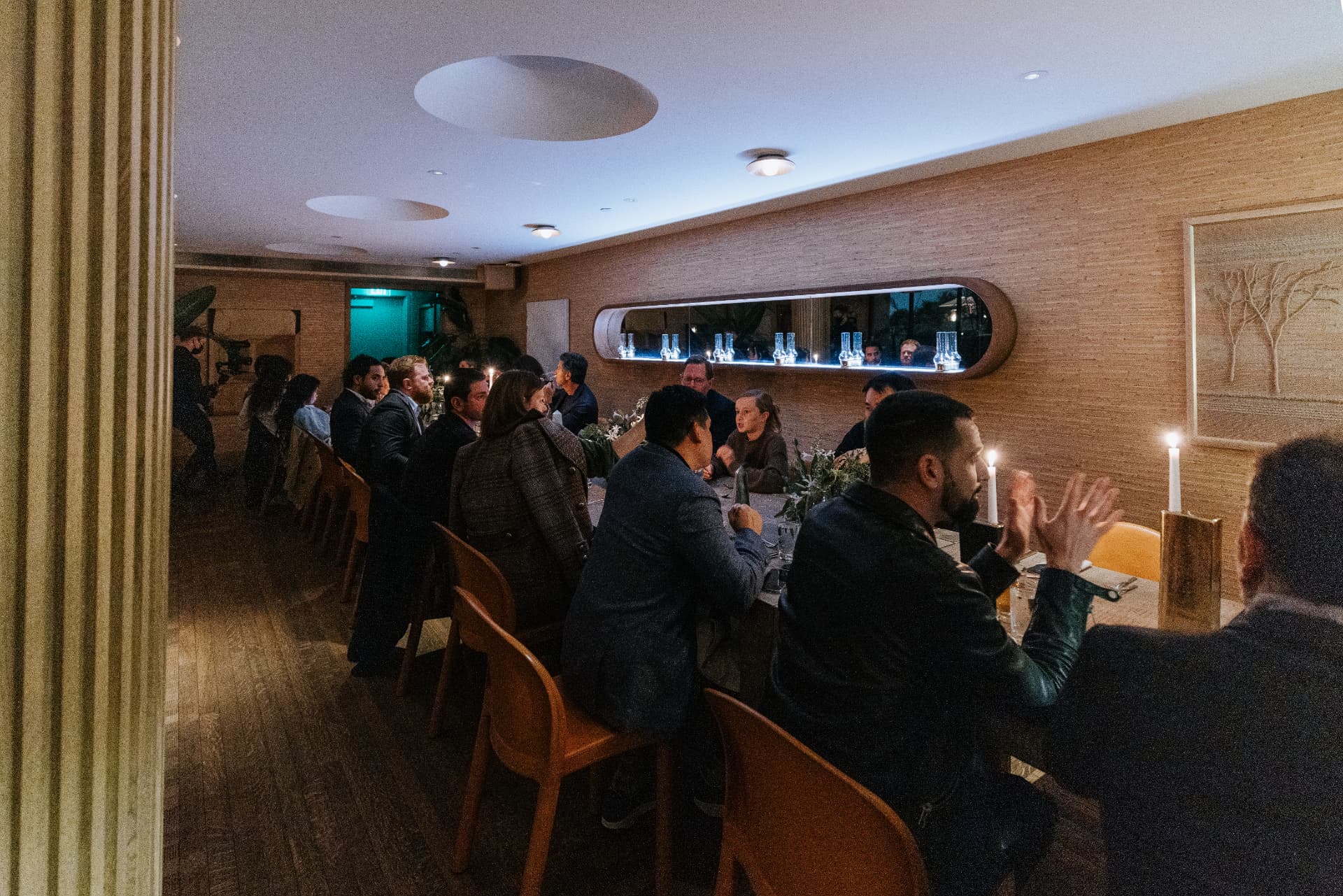 Guests seated at an intimate dinner event
