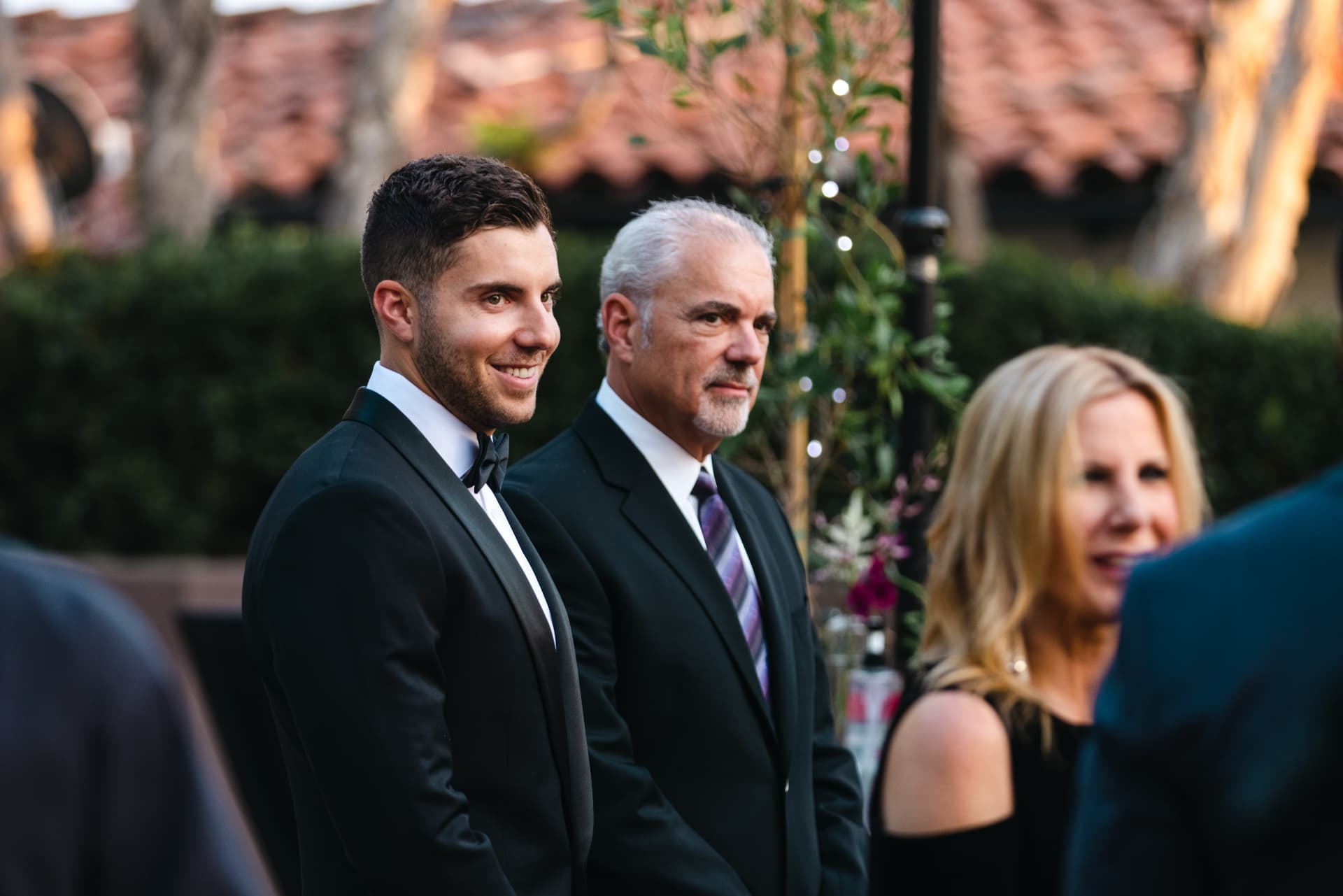 Guests arriving at a black-tie gala