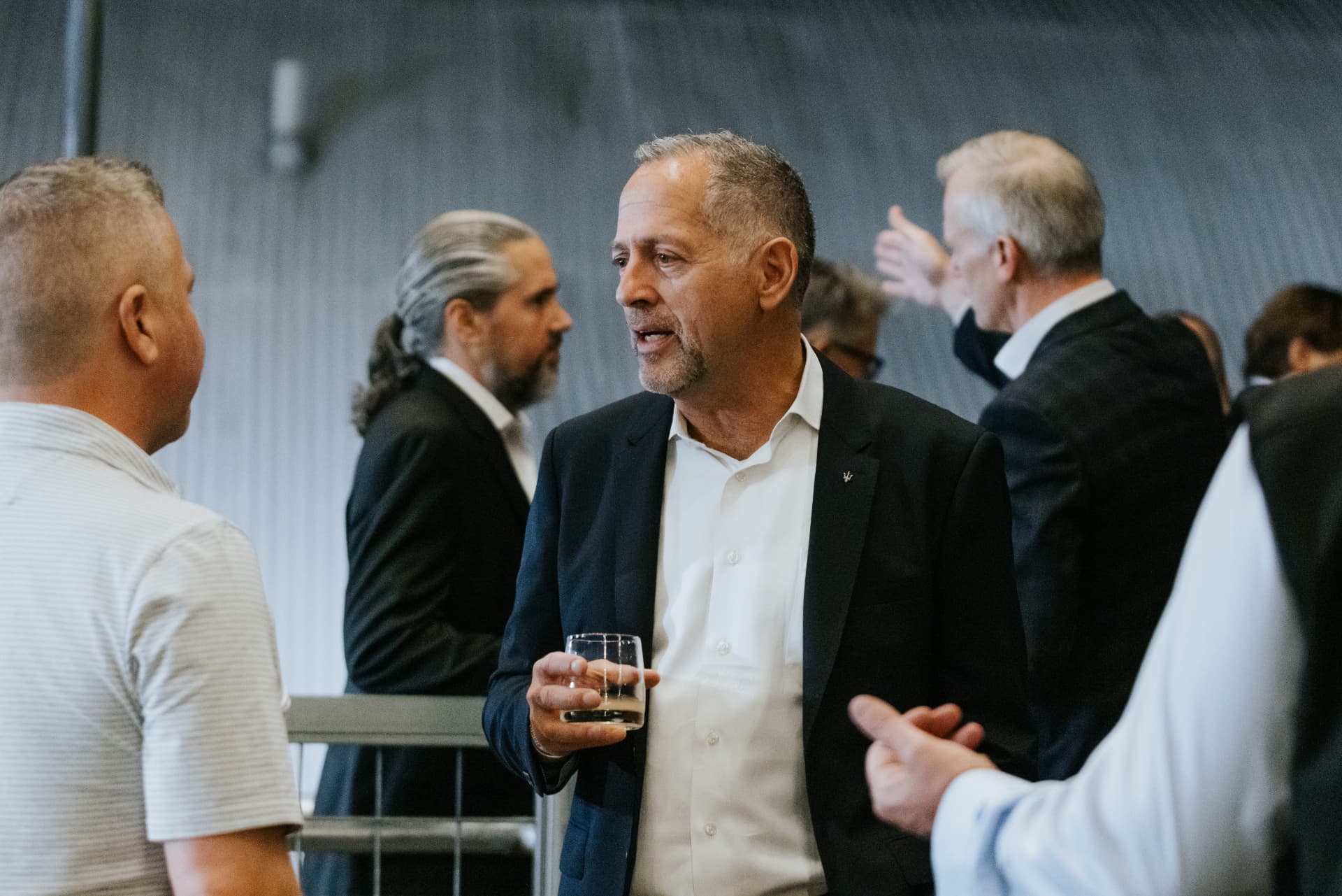 Guests networking at a cocktail reception