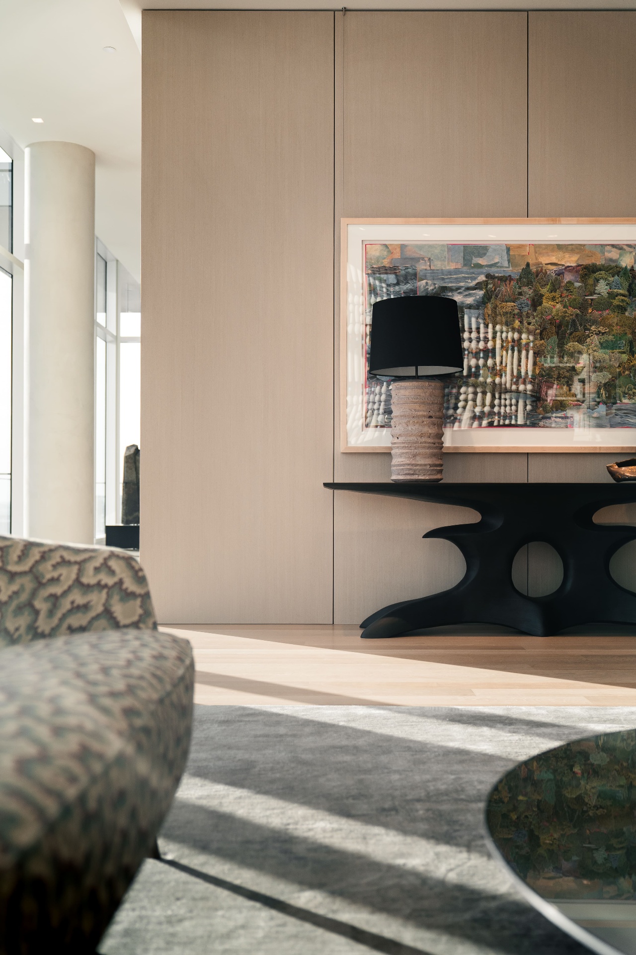 Hall Arts console table with lamp and framed art