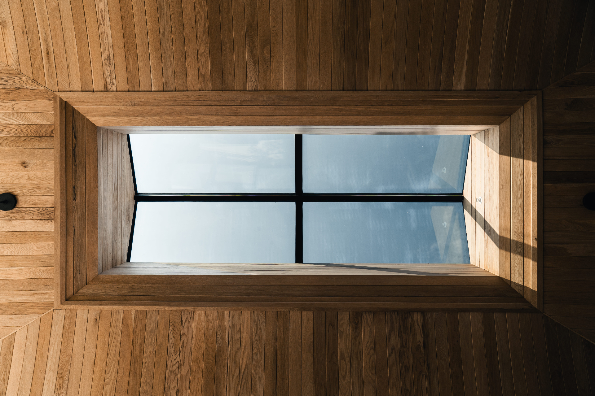 Wood-clad skylight detail viewed from below