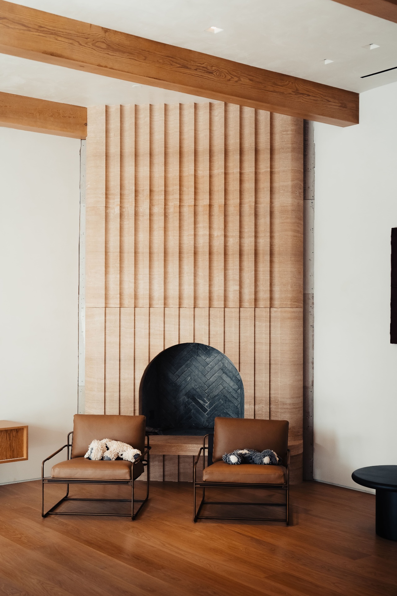 Wisteria fireplace finished installation with leather chairs